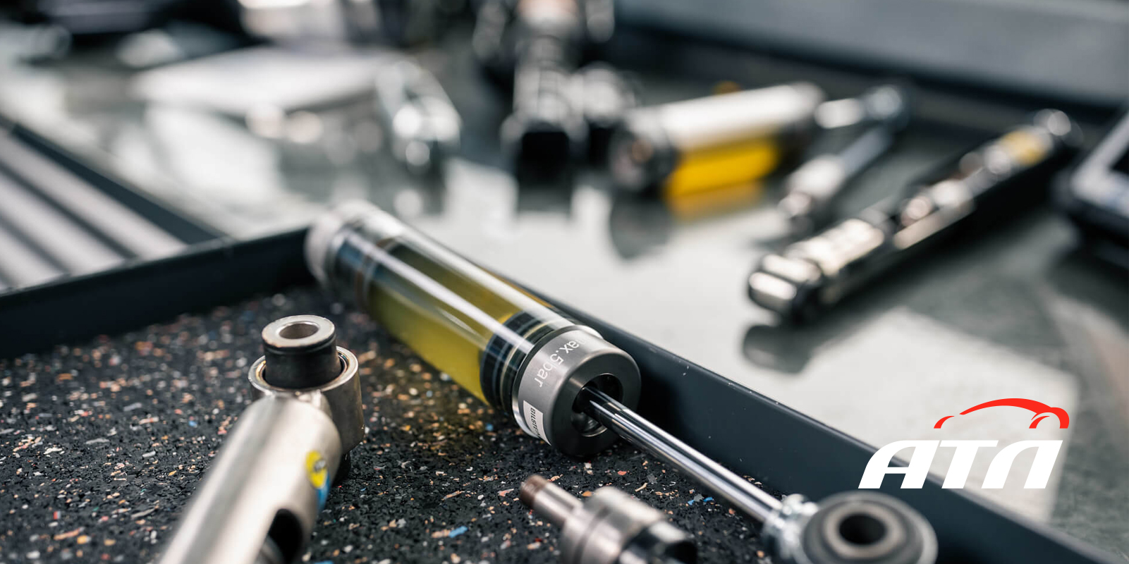 Какой амортизатор лучше: масляный или газомасляный?