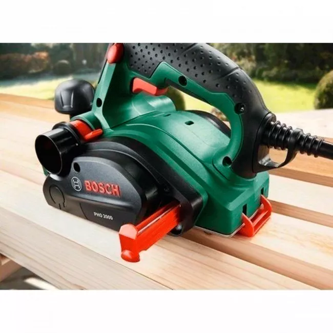 Рубанок Bosch PHO 2000, 680 Вт, ніж 82мм, стругання 2 мм, вибірка паза 8 мм, 2.4кг (0.603.2A4.120)